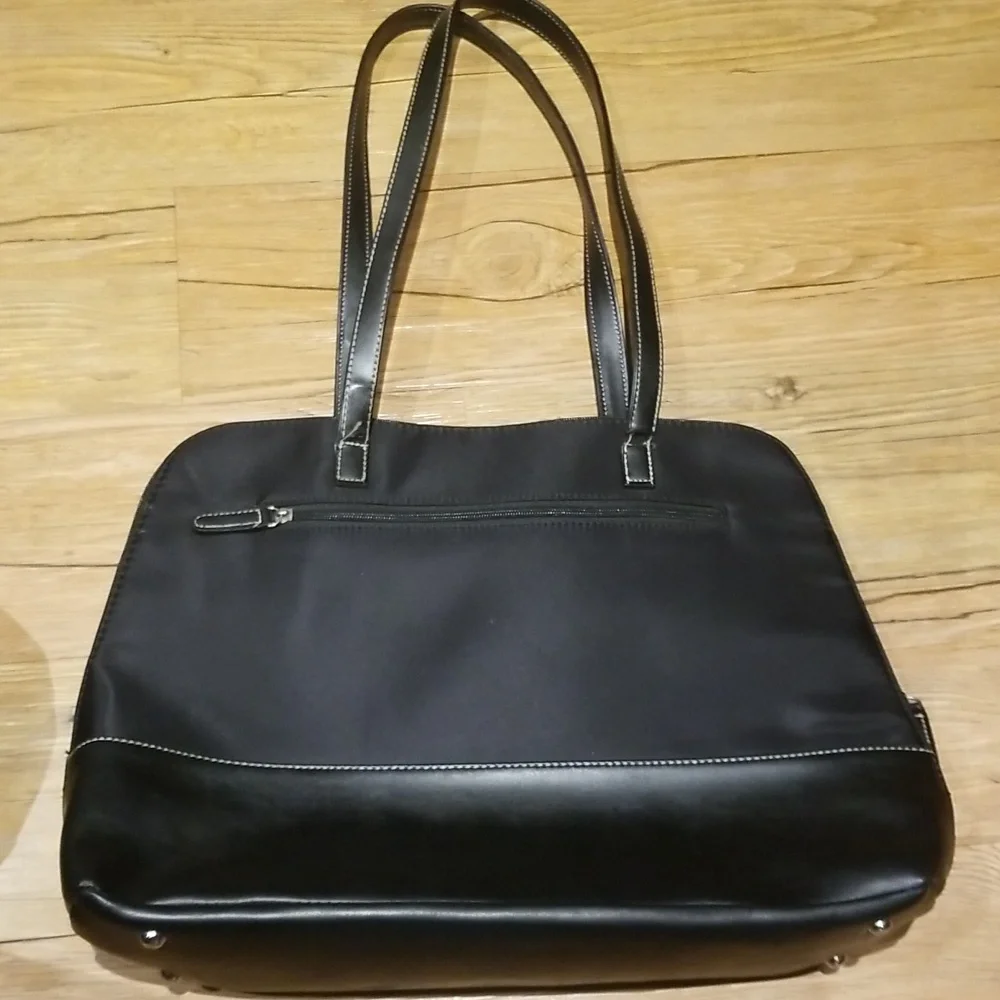 Computer tote w/ many storage area padded for computer